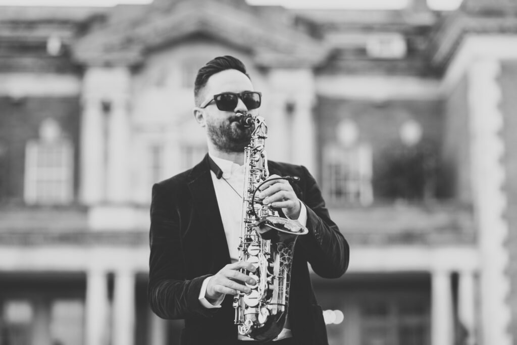 Outdoor Sax Player At Eaves Hall, Clitheroe